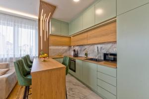 Η κουζίνα ή μικρή κουζίνα στο Rooftop Luxury Apartments Zlatibor