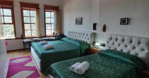 Postel nebo postele na pokoji v ubytování Guest House Panorama