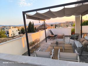 Μπαλκόνι ή βεράντα στο Casa con jardín, aparcamiento