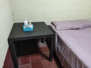 Ένα ή περισσότερα κρεβάτια σε δωμάτιο στο Kame-House Backpackers