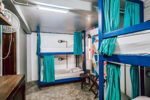 Voodi või voodid majutusasutuse Drift Inn San Pedro toas