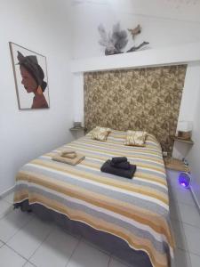 En eller flere senge i et værelse på Ti colibri + 24 billeder