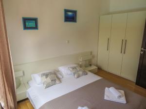 Posteľ alebo postele v izbe v ubytovaní Apartments Eddie