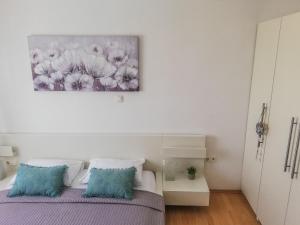 Posteľ alebo postele v izbe v ubytovaní Apartments Eddie