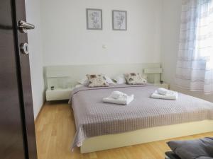 Posteľ alebo postele v izbe v ubytovaní Apartments Eddie