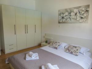 Posteľ alebo postele v izbe v ubytovaní Apartments Eddie