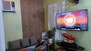 TV a/nebo společenská místnost v ubytování Amigas Transient