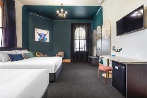 Ramsgate Hotel by Nightcap Social客房内的一张或多张床位
