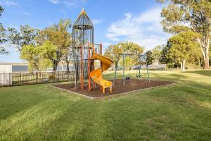 a playground with a slide in a park at Reflections Lake Keepit - Holiday Park in Keepit