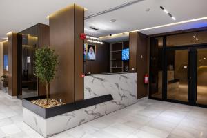 Ο χώρος του λόμπι ή της ρεσεψιόν στο الضيافة المثالية للشقق المخدومة Aldiyafa Serviced Apartments