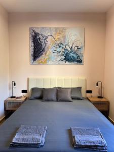 Ένα ή περισσότερα κρεβάτια σε δωμάτιο στο Victory Apartments