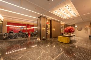 Ο χώρος του λόμπι ή της ρεσεψιόν στο Yicheng Hotel, Jianghan Road Pedestrian Street, Wuhan River Beach