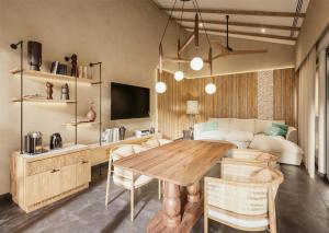 TV a/nebo společenská místnost v ubytování Banyan Tree Mayakoba