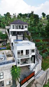 an aerial view of a large white building at Moment Villa in Lembang