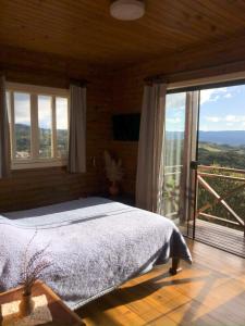 En eller flere senge i et værelse på Casa do Alto + 15 billeder