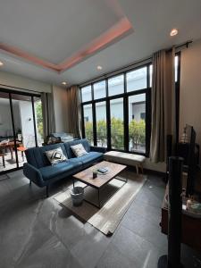 Posezení v ubytování Cha-am Pool Villa