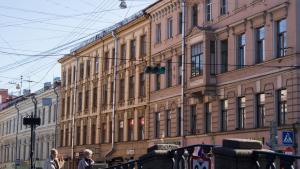 a large building on the side of a street at Asmera Apartments - Gorokhovaya F2 in Saint Petersburg