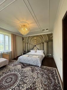 Postel nebo postele na pokoji v ubytování Guest House Alim