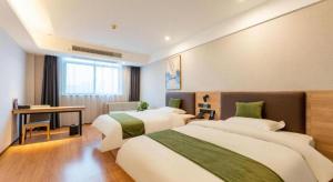 Postel nebo postele na pokoji v ubytování Green Tree Inn Anhui Suzhou Evergrande + 227 fotografií