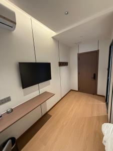 TV o dispositivi per l'intrattenimento presso 合悦精品商务酒店