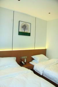 Letto o letti in una camera di 合悦精品商务酒店