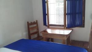 Postel nebo postele na pokoji v ubytování Cabinas Smith 2