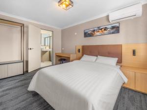 En eller flere senge i et værelse på Spring Hill Inn + 21 billeder