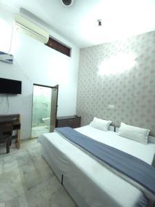 Fotografie z fotogalerie ubytování hotel tripta ganga v destinaci Rišikéš