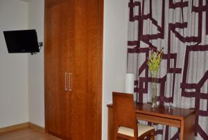 TV a/nebo společenská místnost v ubytování Hotel Jarama