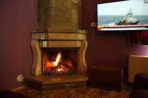 TV a/nebo společenská místnost v ubytování Hotel Bicaj