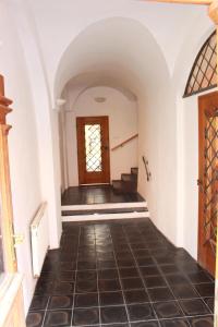 an empty hallway of a house with a door at Penzion Bohemia in České Budějovice