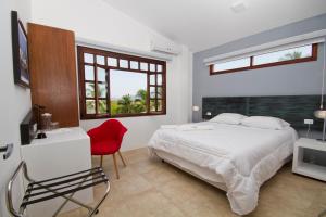 Postel nebo postele na pokoji v ubytování Hotel Volcano