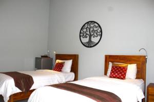 Postel nebo postele na pokoji v ubytování Fishmini Room & Breakfast