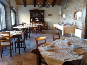 A restaurant or other place to eat at Rosso Di Sera