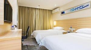 City Comfort Inn Xiangyang Railway Station客房内的一张或多张床位