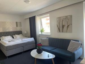 Postel nebo postele na pokoji v ubytování Björnlokan B&B