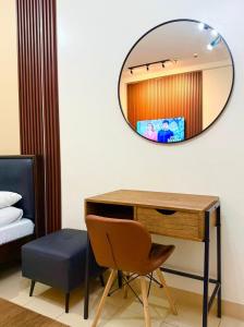 Ruang duduk di Hills Residences by JuJu Staycation