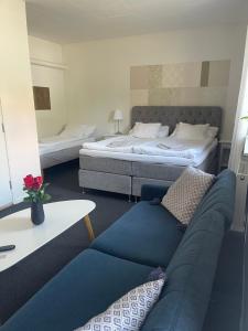 Postel nebo postele na pokoji v ubytování Björnlokan B&B