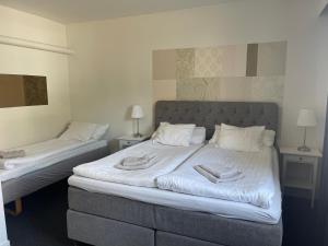 Postel nebo postele na pokoji v ubytování Björnlokan B&B
