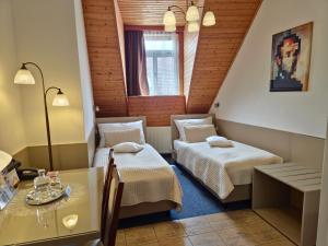 A seating area at Hotel U Růže