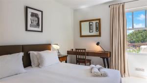 En eller flere senger på et rom på Comfortable villa with ample of modern spaces