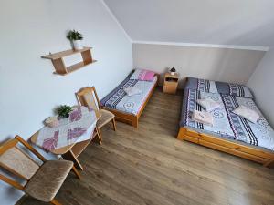 Postel nebo postele na pokoji v ubytování Apartament Regina