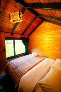 Postel nebo postele na pokoji v ubytování Nesli Villa & Bungalow - Dubleks Bahçeli Villa