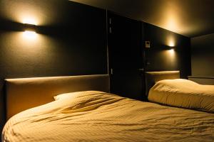 Cama ou camas em um quarto em Cyberdeck for big groups