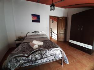 Postel nebo postele na pokoji v ubytování Casa Rural El Solarillo