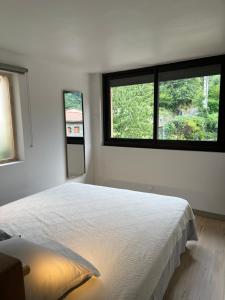 Postel nebo postele na pokoji v ubytování gîtes du Cady
