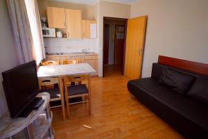 Kuchyň nebo kuchyňský kout v ubytování Appartement Alpensee