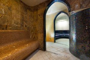 Posteľ alebo postele v izbe v ubytovaní Hotel Metropol