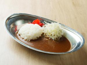 a plate of food with rice and sauce on a table at CHISUN BUDGET Kanazawa Ekimae in Kanazawa +43 photos