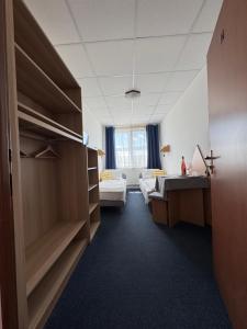 Posteľ alebo postele v izbe v ubytovaní Resort Kovács